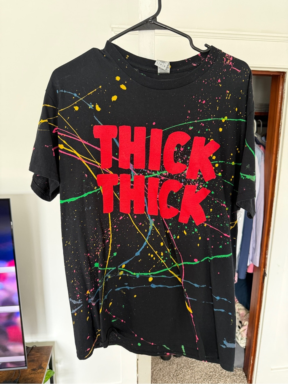 Black Graphic Tee with Red "THICK THICK" Text
